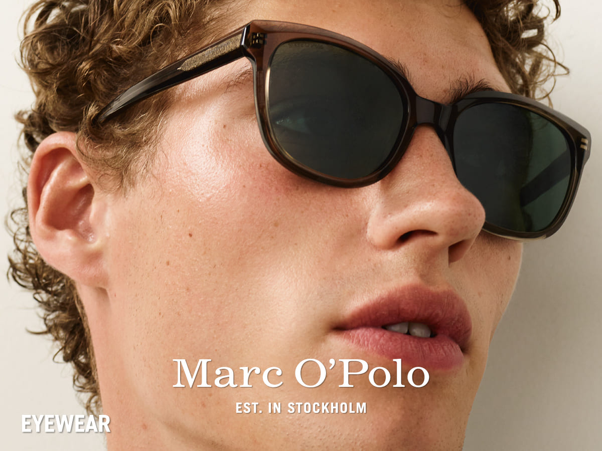 Junger Mann mit lässiger schwarzer Marc o Polo Sonnenbrille von Optik Gronde, Augsburg